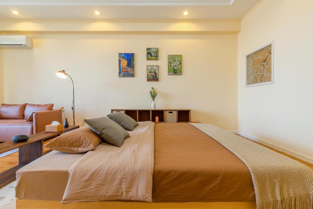 Dalian Baobab Apartment - 东港安静舒适海港景色哈趣投影
