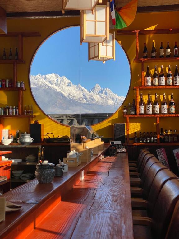 丽江雪山奔鼓酒店（束河古镇店）